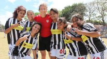 Tracy joins the girl Costa Rican soccer players.