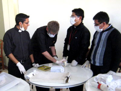 Workshop participants in Arequipa, Peru, learn how to handle and inventory cultural objects in their Colonial period churches 