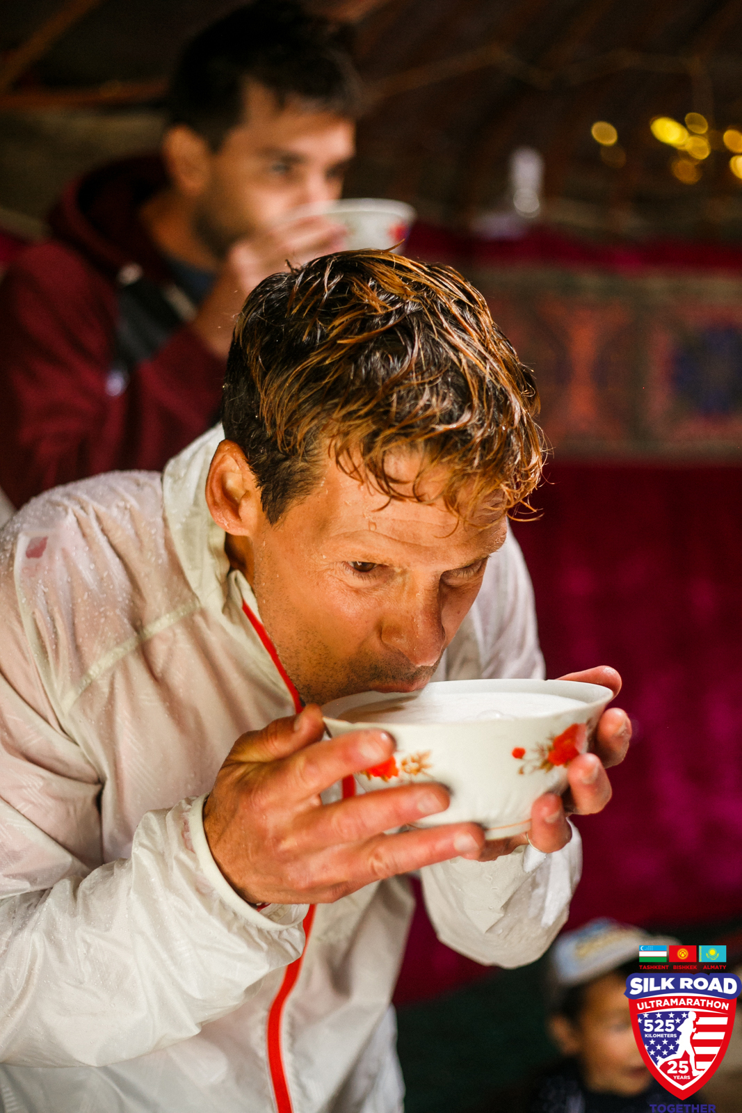 Dean drinking kumis or fermented horse milk, a Kyrgyz staple