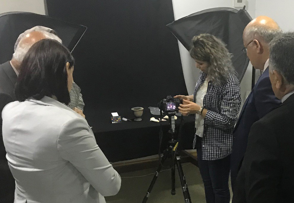 Workshop participants learn about photographic techniques for documenting important cultural heritage