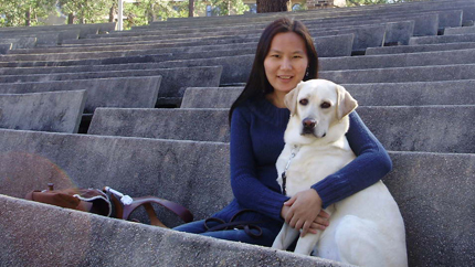 Fulbright Foreign Student alumna Uyanga Erdenebold with her seeing-eye dog, Gladys