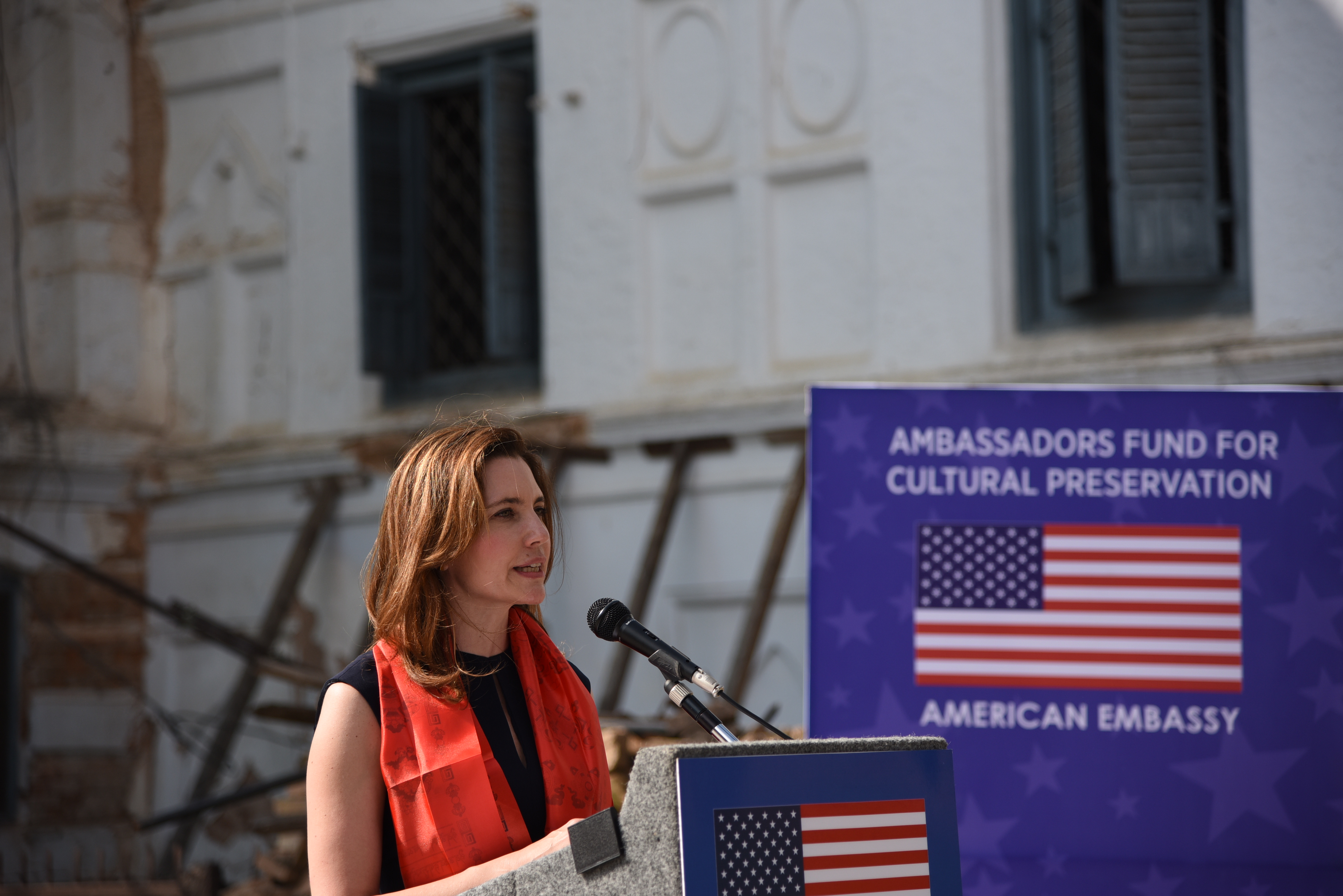 Woman speaking at podium