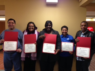 Delegates show off their certificates from NIU