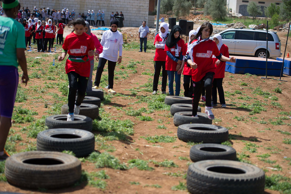 The participants are so enthused for the drills,  that they readily take on the tires to help prepare