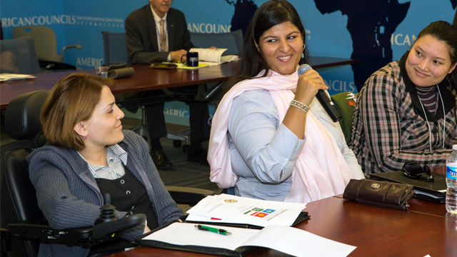 Left to right: Farida Alibakhshova, a fellow from Tajikistan, Sarah Shaikh, a fellow from Pakistan (introducing herself), and Seinep Dyikanbaeva, a fellow from Kyrgyzstan during orientation.