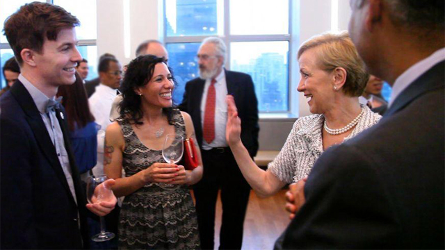 Assistant Secretary Ann Stock (right) chats with 2011-2012 Fulbright-mtvU nominating judges and indie pop band Matt & Kim at a reception celebrating the five-year Fulbright-mtvU relationship. The event was co-hosted by United States Ambassador to the Unit