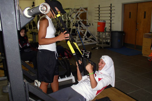 At Hampton University in Hampton, Virginia, the girls learn exercises to build strength. 