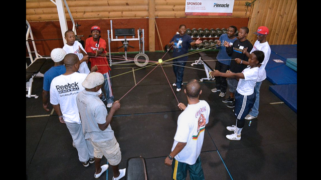 The coaches participate in a sports psychology and team-building workshop in Nashville, Tennessee.
