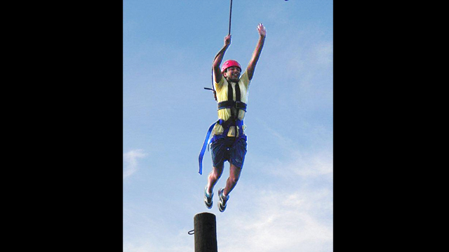 The group of Tunisian athletes participate in team building activities.