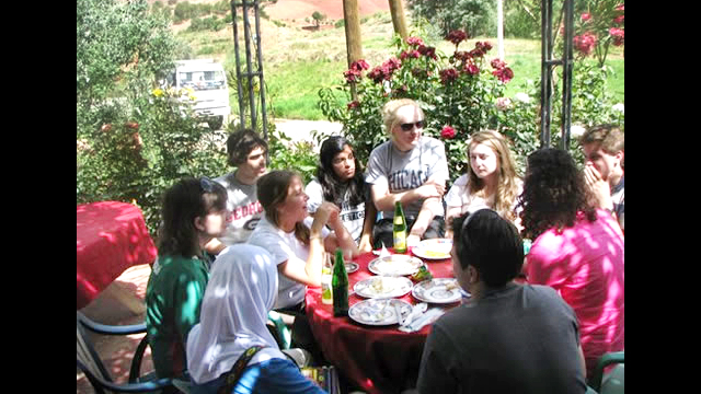 NSLI-Y scholars discuss their experience following a meal.
