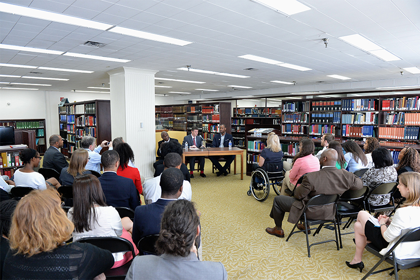 Jason Collins draws in a large group of supportive State Department employees. 