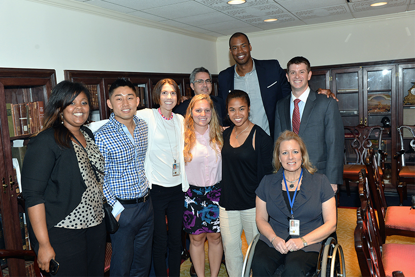 Jason Collins huddles with the State Department’s Sports Diplomacy team after the program. 