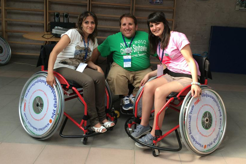 Armenian participants who will visit the U.S. in September 2014 experience sport-wheelchairs with an American participant.