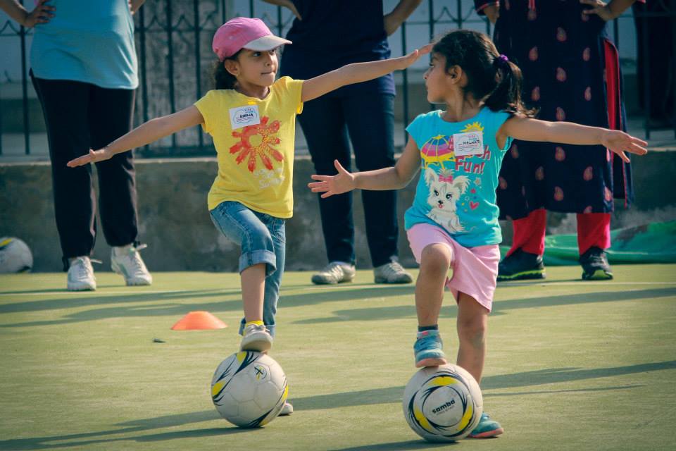 Two young players engage in a skills drill at a GO GIRL Pakistan camp