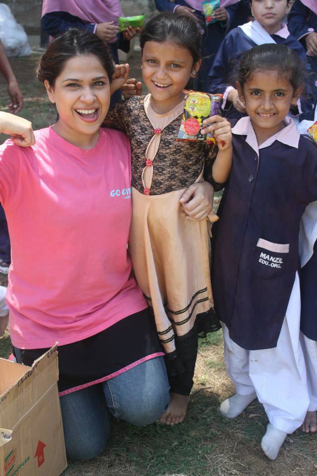 Fatima poses with a few of her young fans