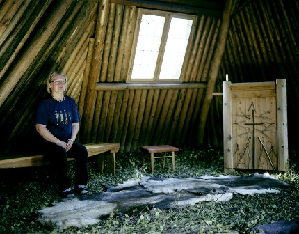 Woman with Reindeer Hide Floor Covering 