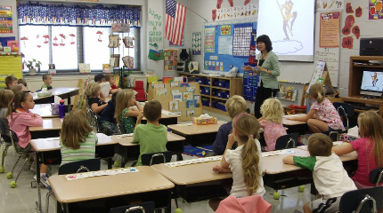 Li Shumeng taught at Cullowhee Valley School in North Carolina during the 2011-2012 school year. In this picture she is introducing the Chinese story of the Monkey King.