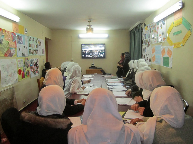 Afghan students engage with their US peers during a videoconference, part of a yearlong virtual exchange program with Global Nomads Group.