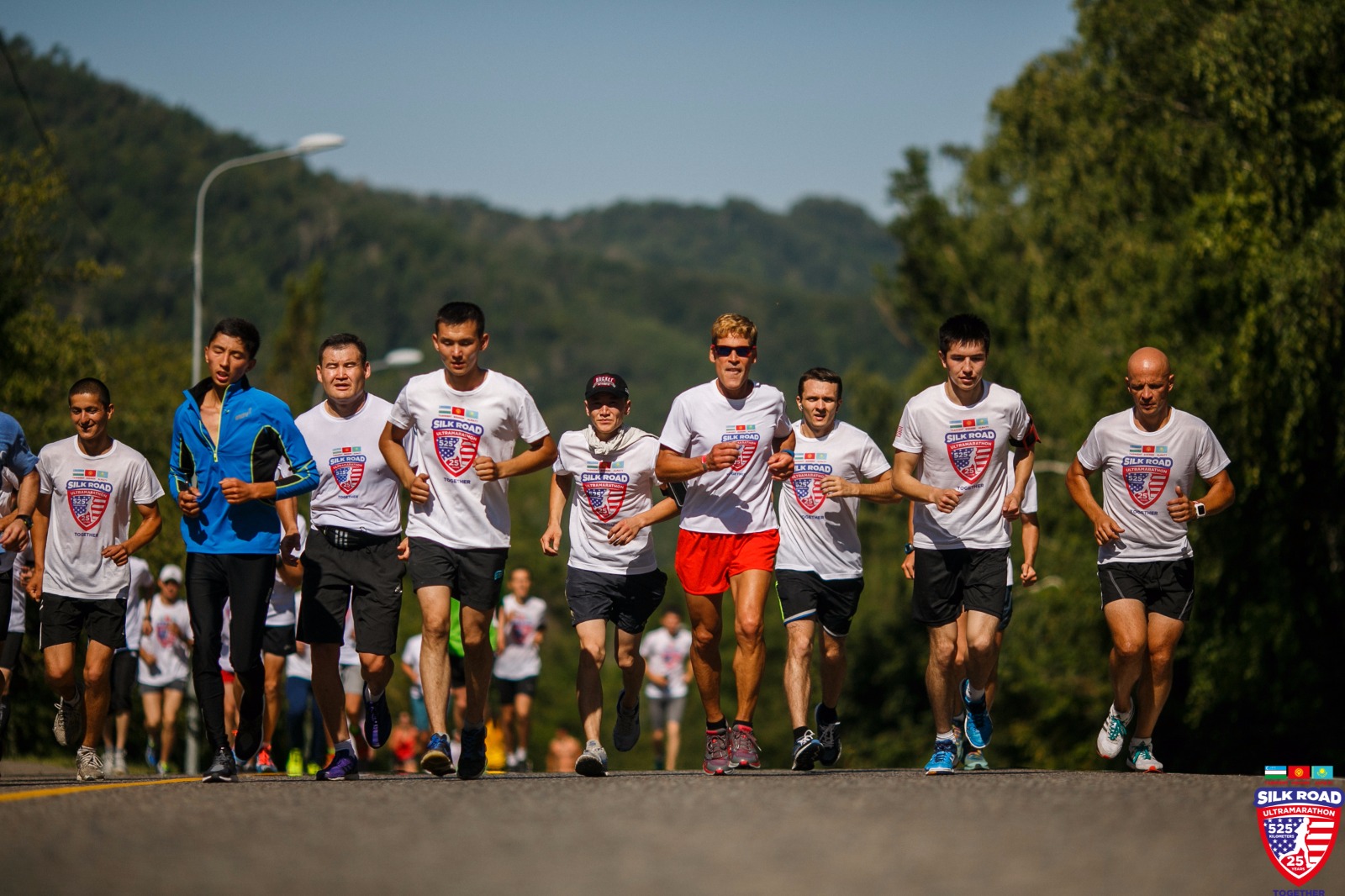 Dean running with a group of runners