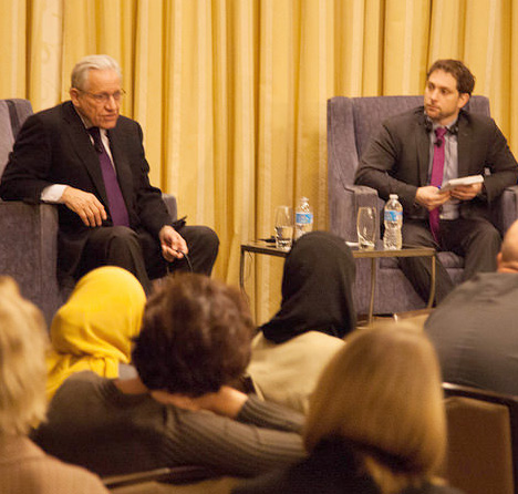 Ben Bradlee sits on stage next to moderator