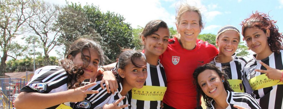 Tracy joins the girl Costa Rican soccer players.