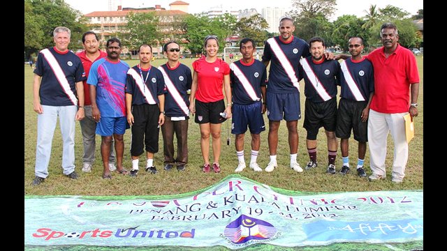 Tony Sanneh, Danielle Slaton and Ambassador Jones join Malaysian soccer coaches after a day of sessions and training clinics.