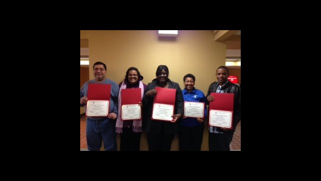 Delegates show off their certificates from NIU