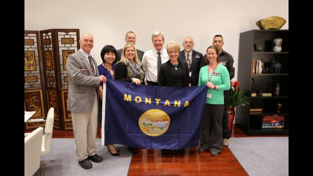 U.S. Ambassador to China Max Baucus, a former Senator from Montana, meets with the Sport for Social Change group at the U.S. Embassy in Beijing.