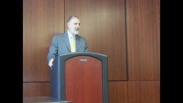 President of Northern Illinois University, Douglas Baker, addressing the delegates