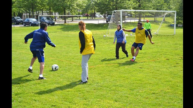 The Egyptian soccer coaches participate in scrimmages and drills with Coach John Hermina.