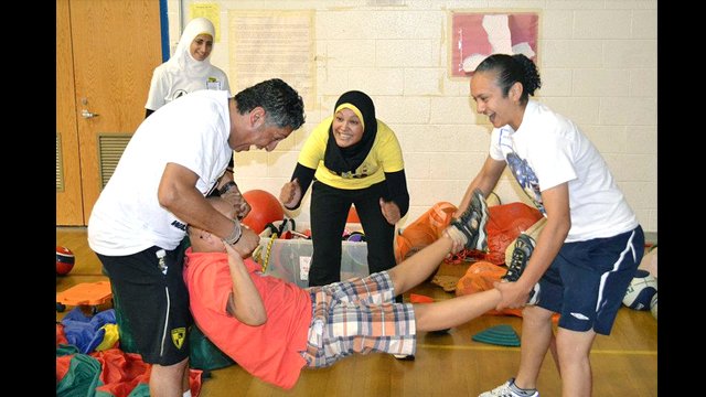 Egyptian soccer coaches engage in sports and disabilities activities.