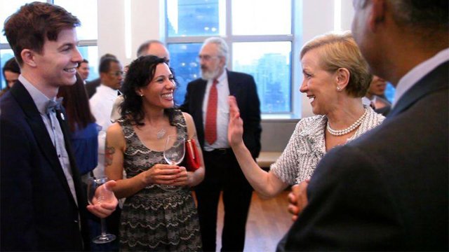 Assistant Secretary Ann Stock (right) chats with 2011-2012 Fulbright-mtvU nominating judges and indie pop band Matt & Kim at a reception celebrating the five-year Fulbright-mtvU relationship. The event was co-hosted by United States Ambassador to the Unit
