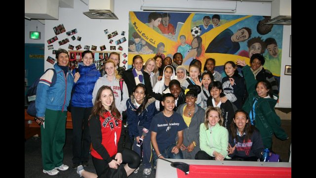 After visiting a local Boys and Girls Club chapter in Denver, the group poses for a photo.