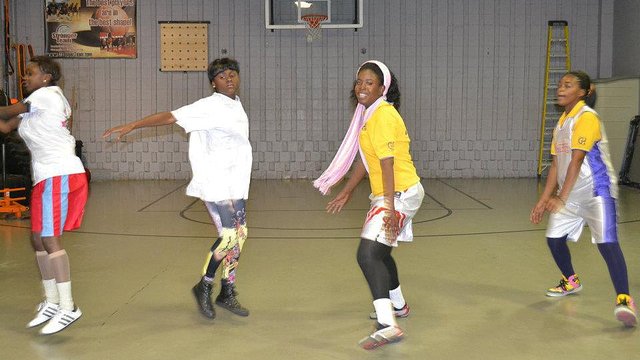Every workout started with a warm-up for the DRC visitors.