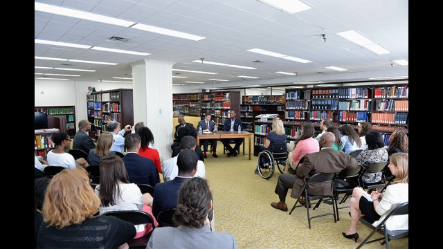 Jason Collins draws in a large group of supportive State Department employees. 