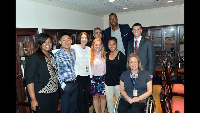 Jason Collins huddles with the State Department’s Sports Diplomacy team after the program. 