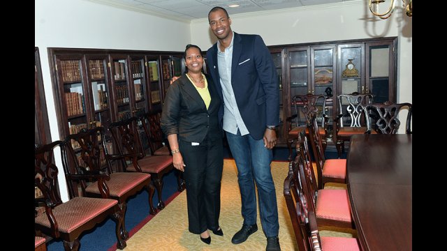 Jason Collins with a representative of the Office of Civil Rights.