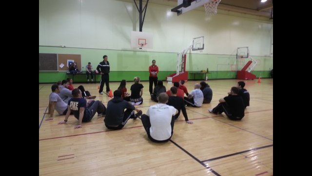 The delegates observing an NIU university class teaching physical educators techniques for positive youth development
