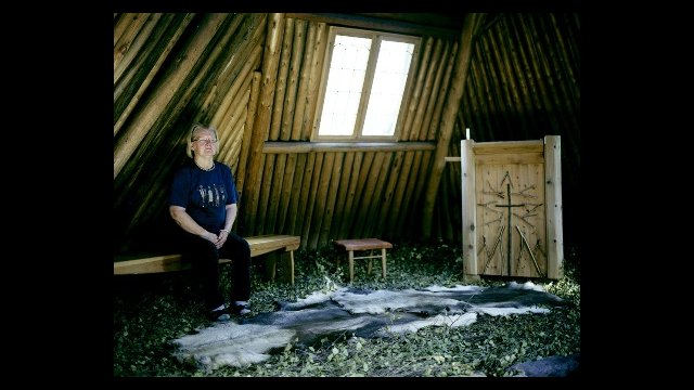 Woman with Reindeer Hide Floor Covering 