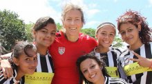 Photo of sports envoy and participants