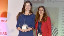 Shaden Mar’i of Jordan (left) receives her award for Best Mid-Level Technology Executive at the Women in Technology Awards in Dubai on January 15th.