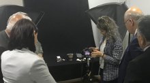 Workshop participants learn about photographic techniques for documenting important cultural heritage