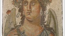 Picture of artwork of a woman using small stones