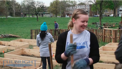 Fulbright Seminar participant, helping to create a community garden.