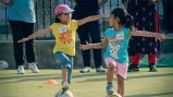 Two young players engage in a skills drill at a GO GIRL Pakistan camp