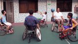 Dr. Woodson-Smith plays wheelchair basketball with some of the students at Guangzhou English Training Center (GETCH). Dr. Woodson-Smith plays wheelchair basketball with some of the students at Guangzhou English Training Center (GETCH).
