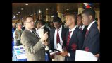 Scott Johnson of North Hennepin Community College and other recruiters advise students at a College and Career Fair in Abuja, Nigeria