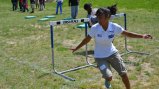 The sports visitors learn new track and field techniques and exercises at a clinic in Washington.