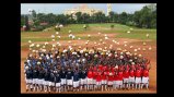 Ugandan soccer coaches throw their soccer balls in the air in Kampala.