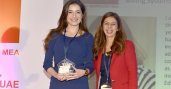 Shaden Mar’i of Jordan (left) receives her award for Best Mid-Level Technology Executive at the Women in Technology Awards in Dubai on January 15th.